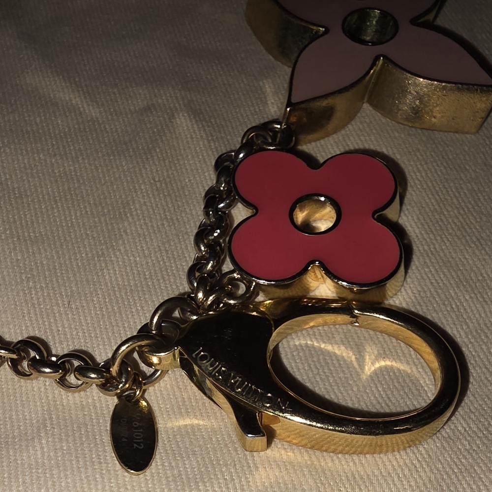 Authentic Louis Vuitton Floral Pink and Gold Key Holder a solid pink color - Picture 9 of 16